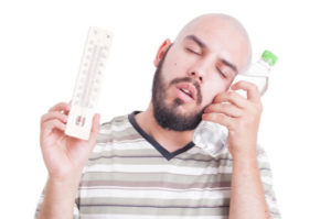 Vigilant Man Hot Home Temperature Shutterstock 302916845